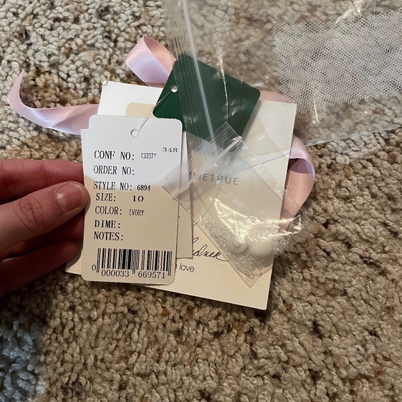 Beautiful Lace and Tulle Sleeveless A-Line Wedding Dress  Voyage Bridal Collecti - Picture 6 of 11